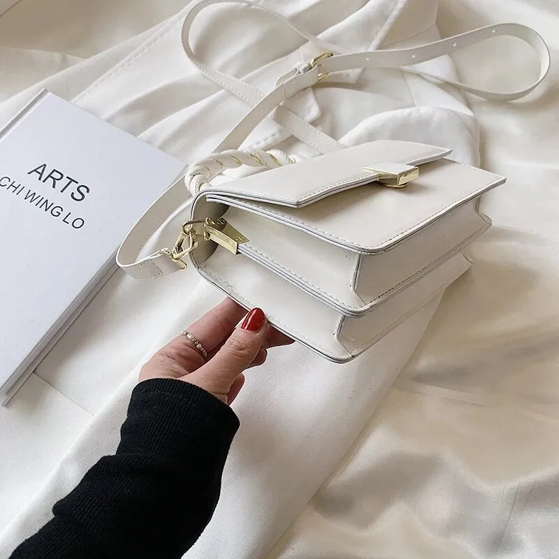 Twisted Gold Handbags