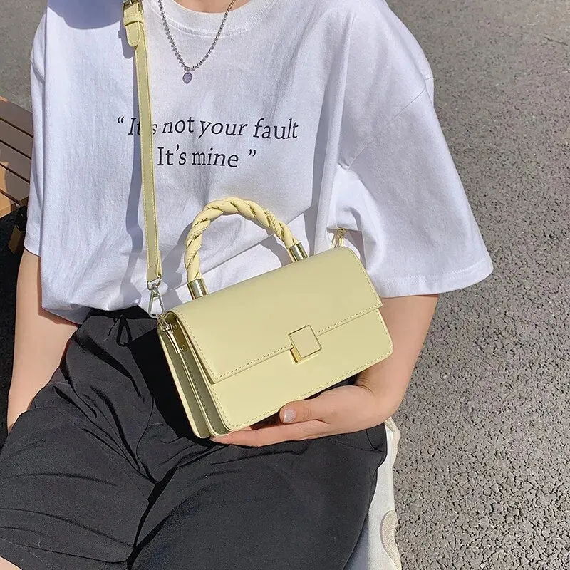 Twisted Gold Handbags