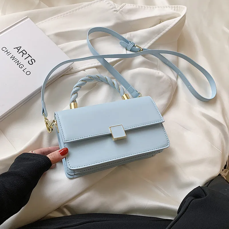 Twisted Gold Handbags