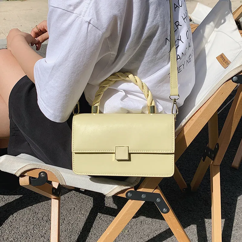 Twisted Gold Handbags