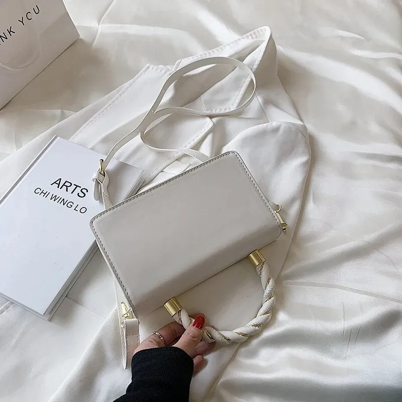 Twisted Gold Handbags
