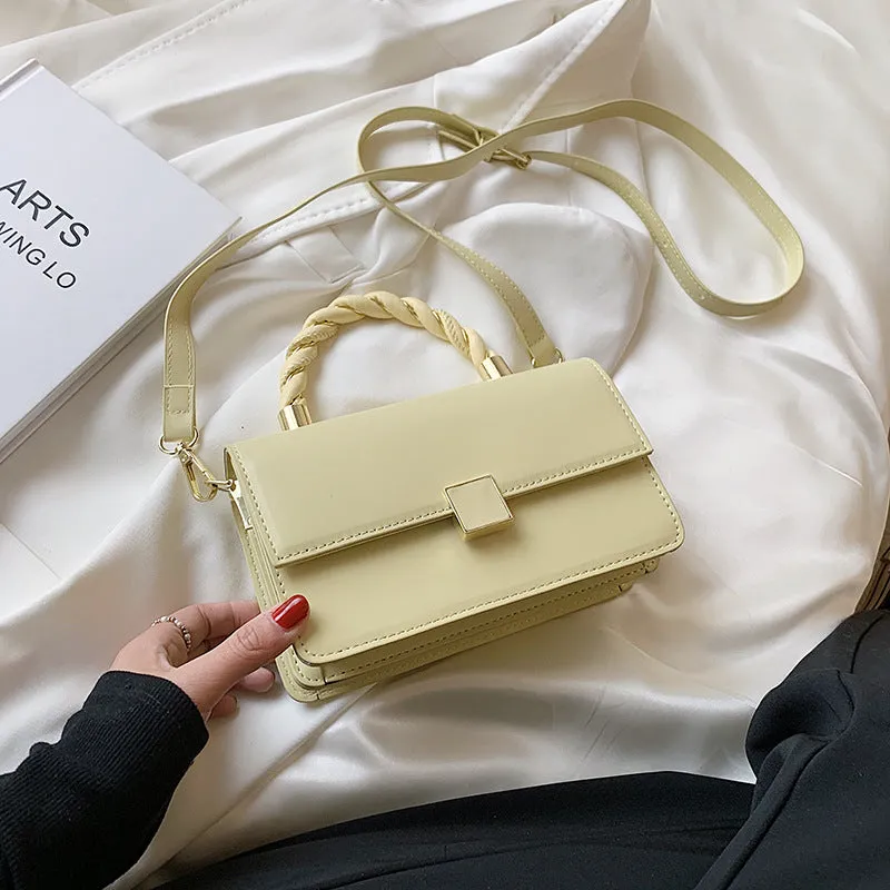 Twisted Gold Handbags