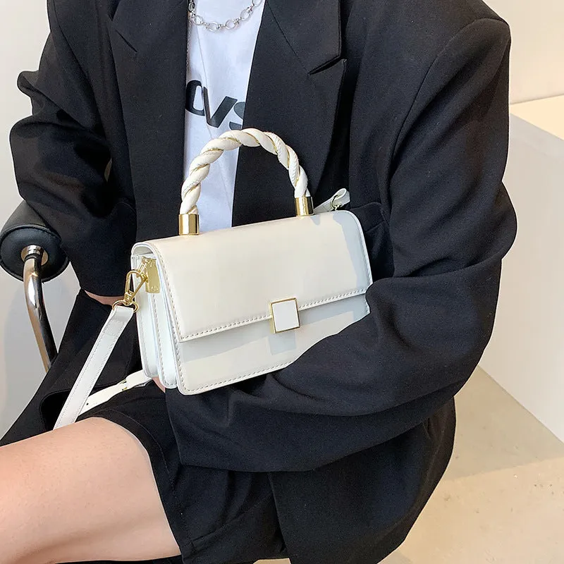 Twisted Gold Handbags