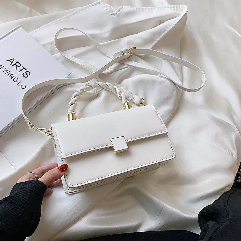 Twisted Gold Handbags
