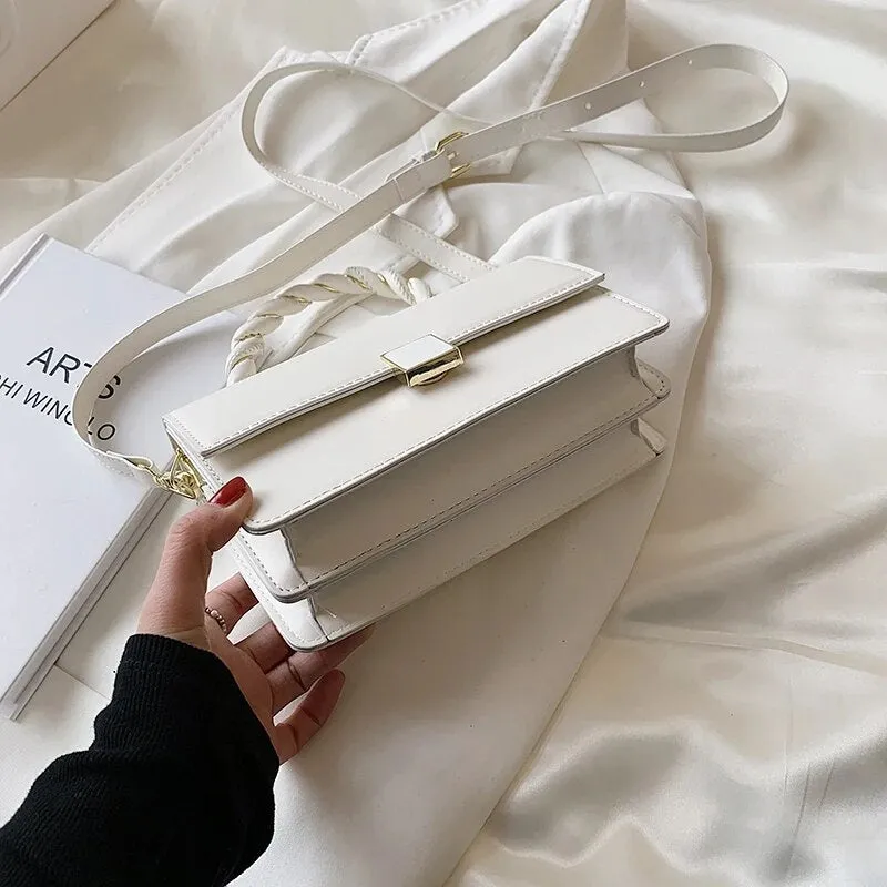 Twisted Gold Handbags