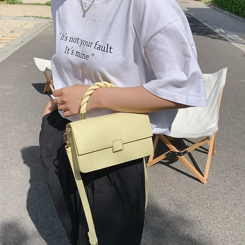 Twisted Gold Handbags