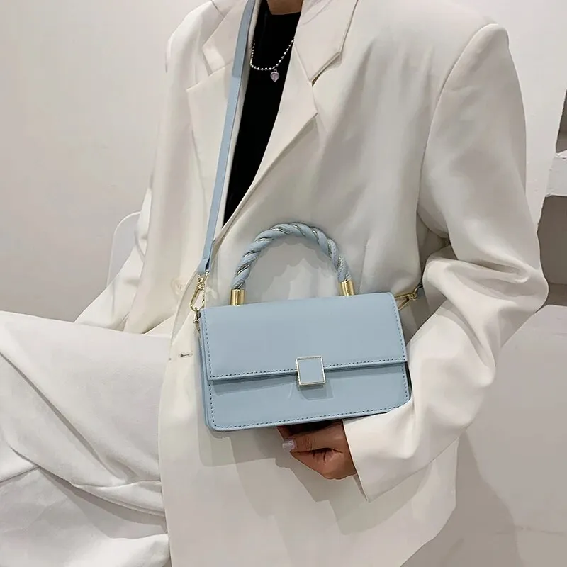 Twisted Gold Handbags