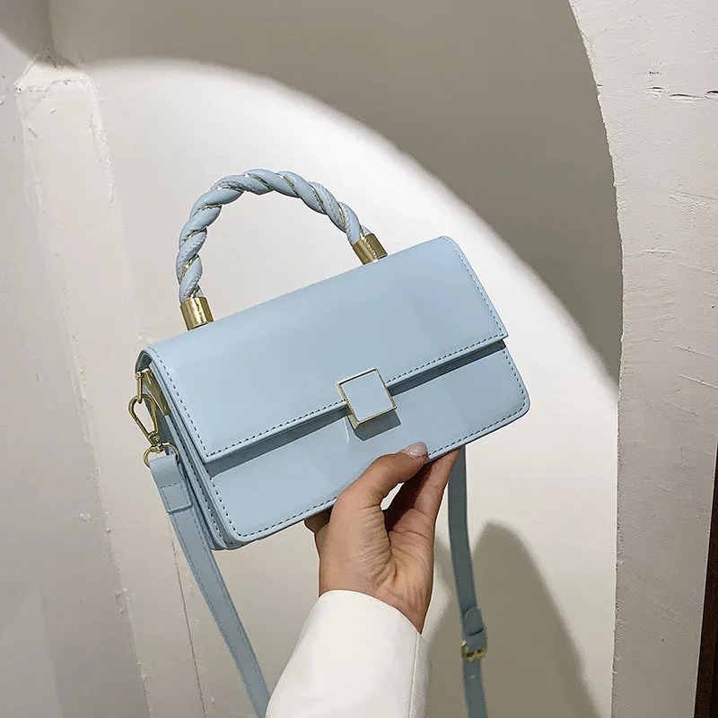 Twisted Gold Handbags
